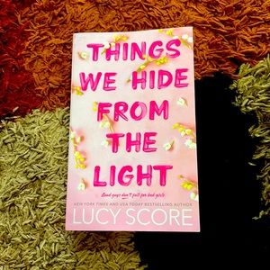 Things We Hide From The Light by Lucy Score. $5